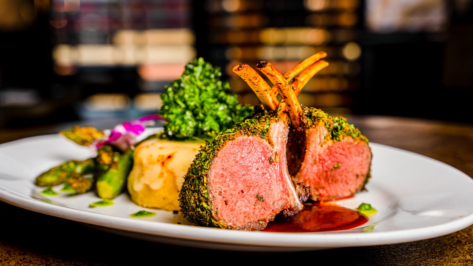 Herb-crusted rack of lamb over mashed potato with roasted vegetables at Bamboo Walk Caribbean Restaurant, shot for the menu